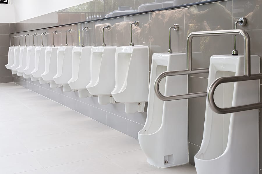 commercial urinal plumber